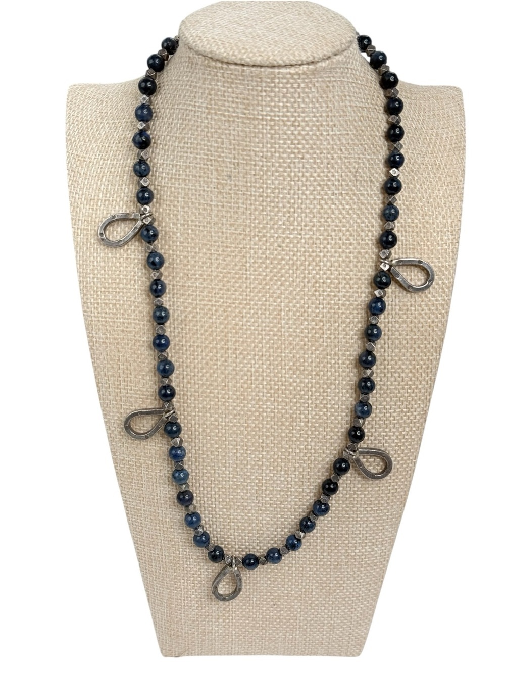 sterling silver necklace dark blue lapis lazuli beads geometric silver accents.